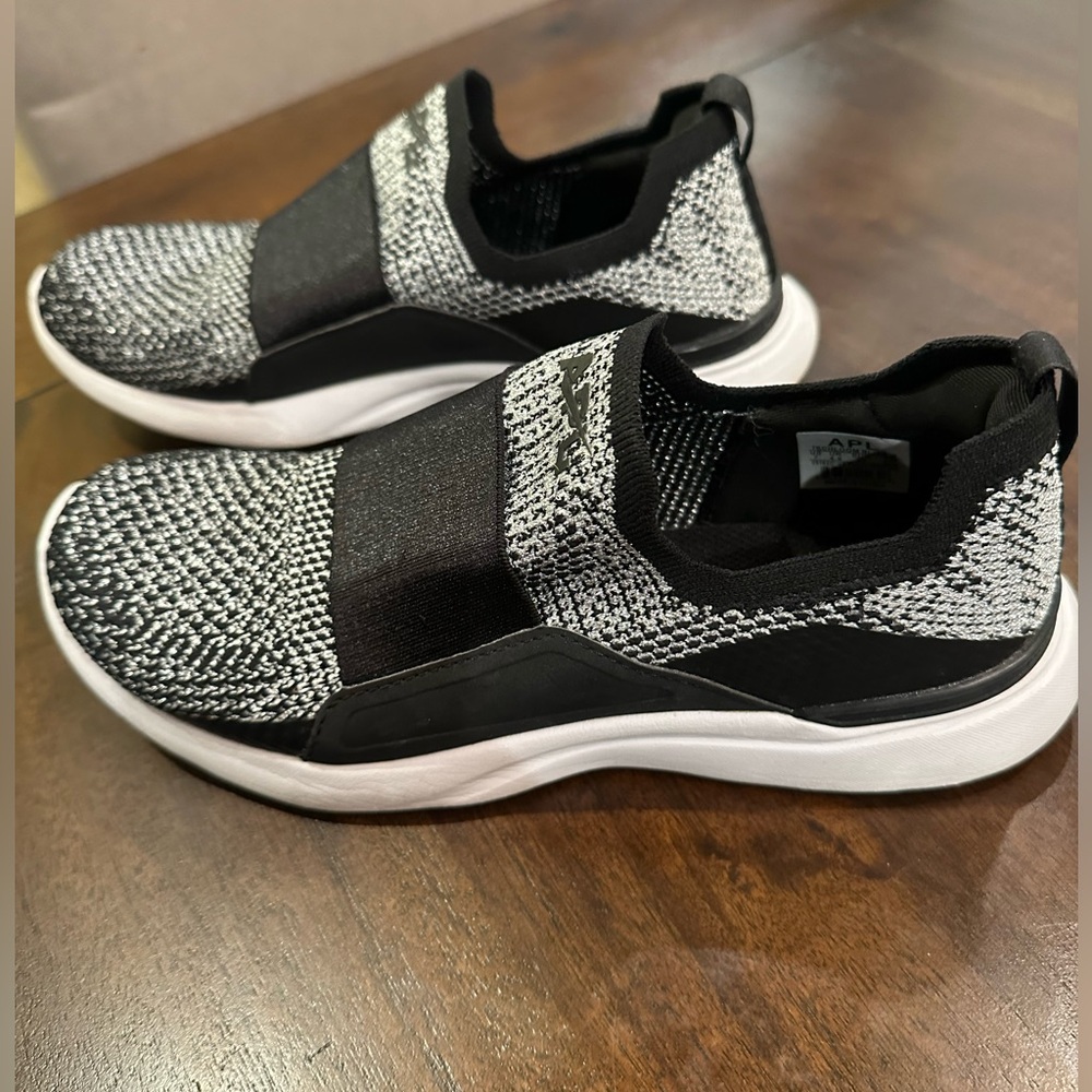 APL  Black and White Slip-On Sneakers